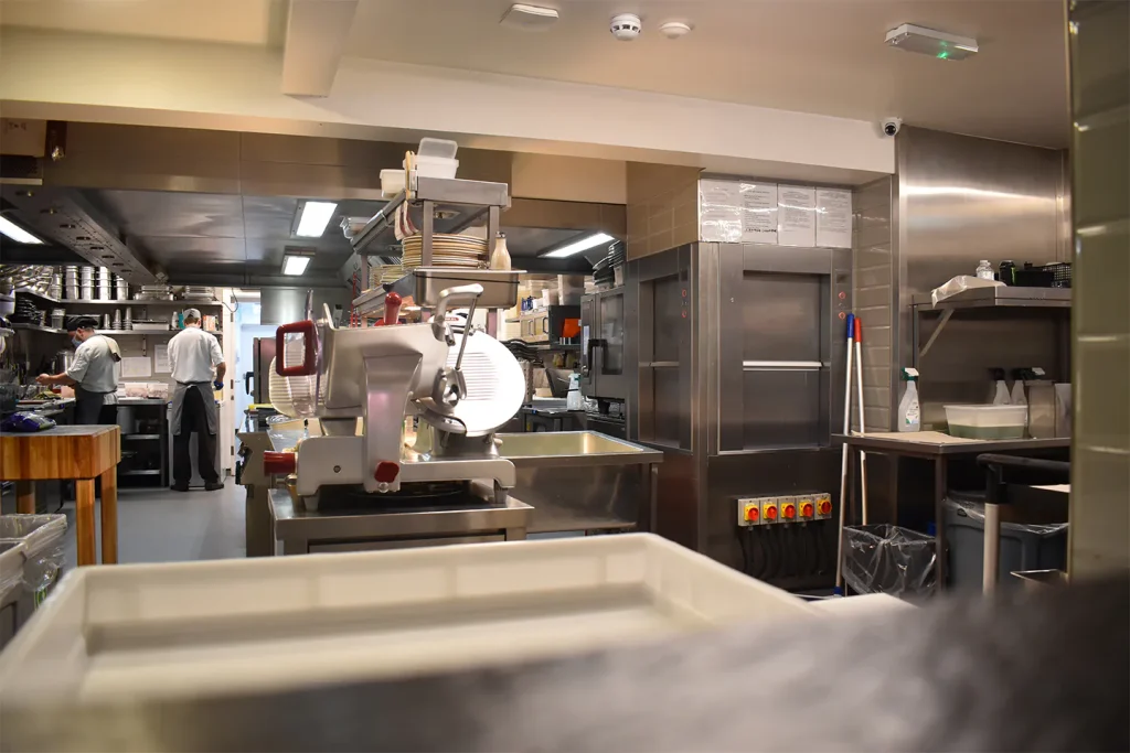 A commercial kitchen with a dumbwaiter in London